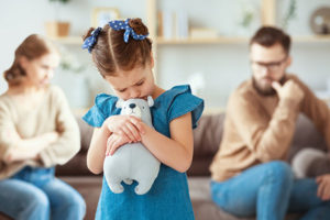 Parent having a difficult conversation with child about divorce